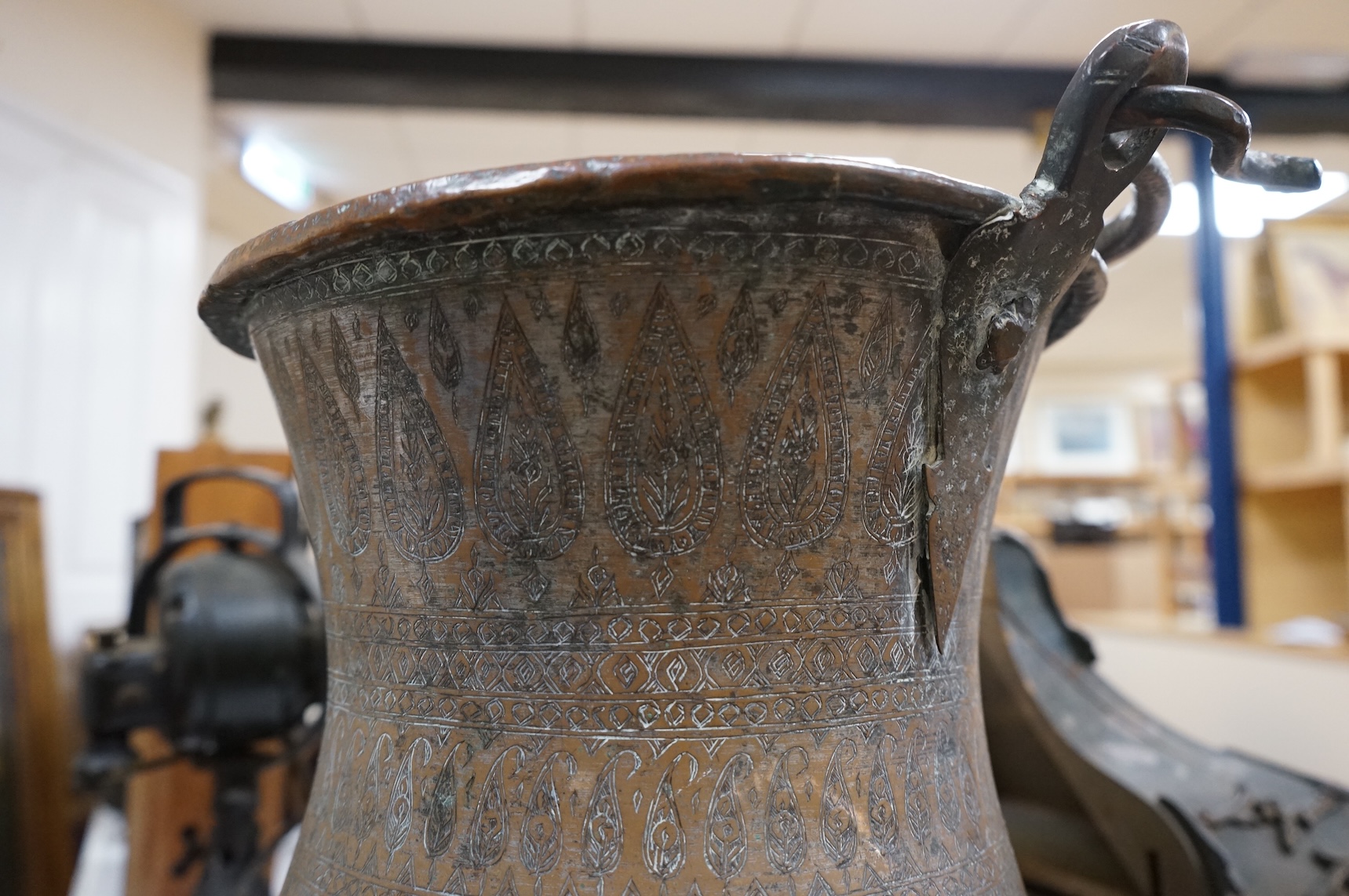 A large Indian copper water pot, 38cm high